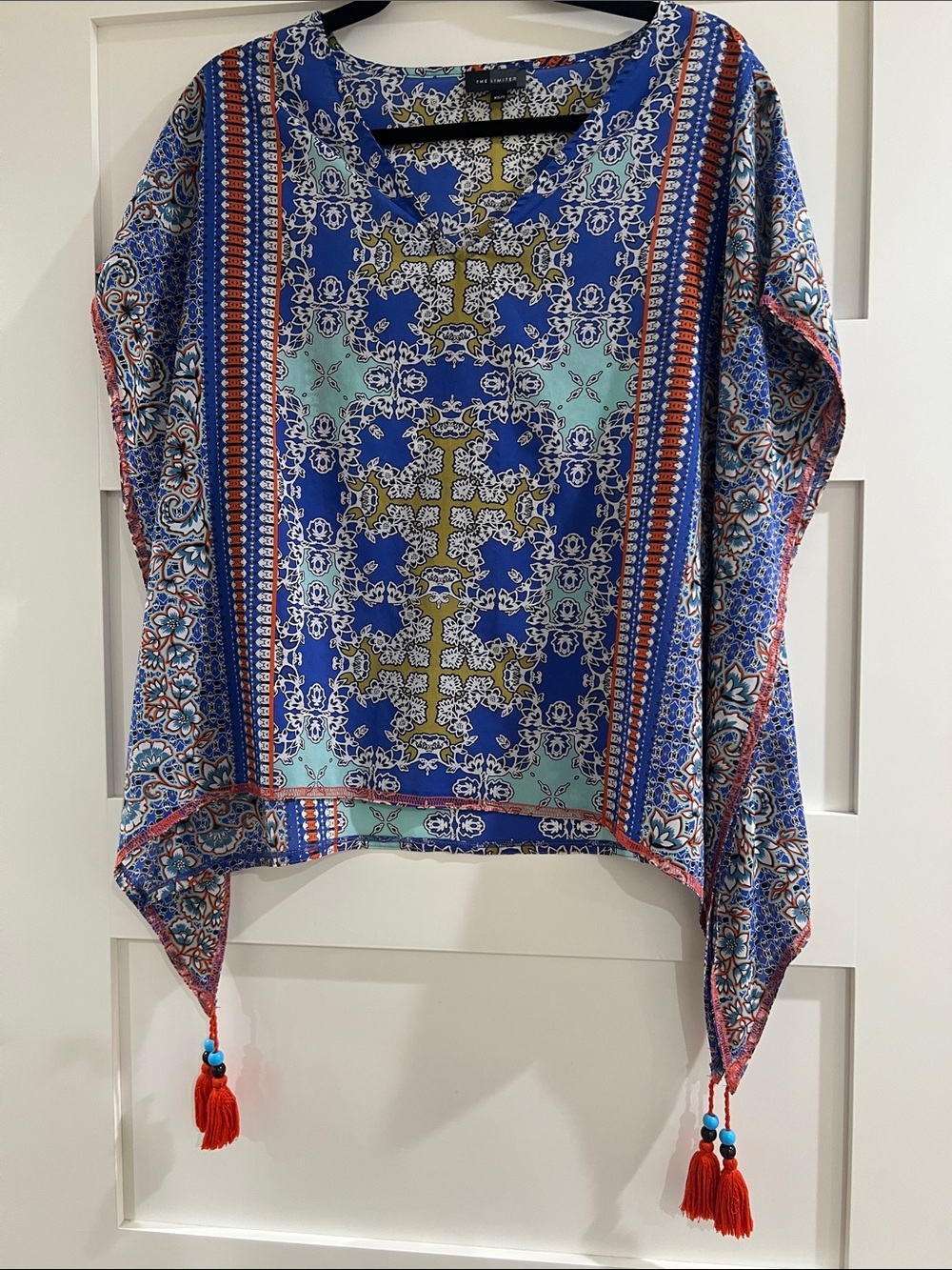 The Limited Boho Blue & Aqua Patterned Poncho Top with Red Tassels
